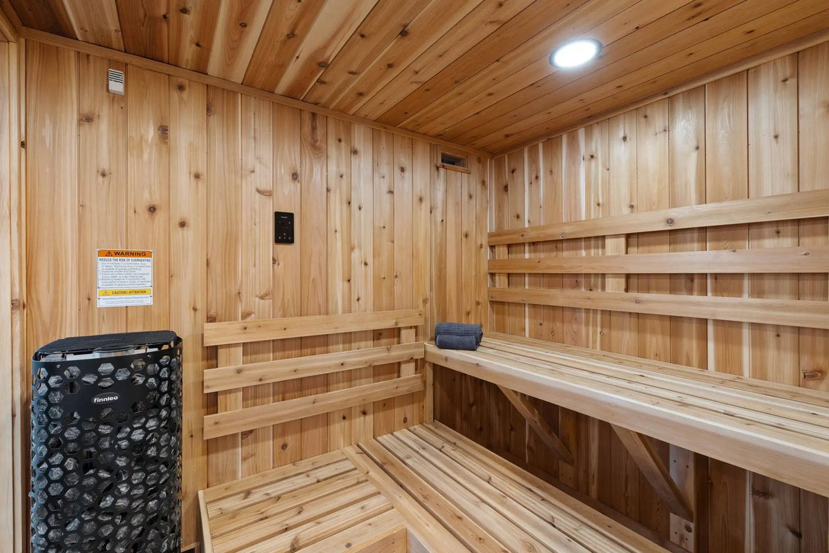 interior of the sauna showing the heater and the decks