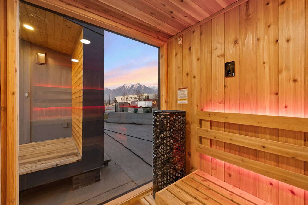 inside sauna with red light rays and heater