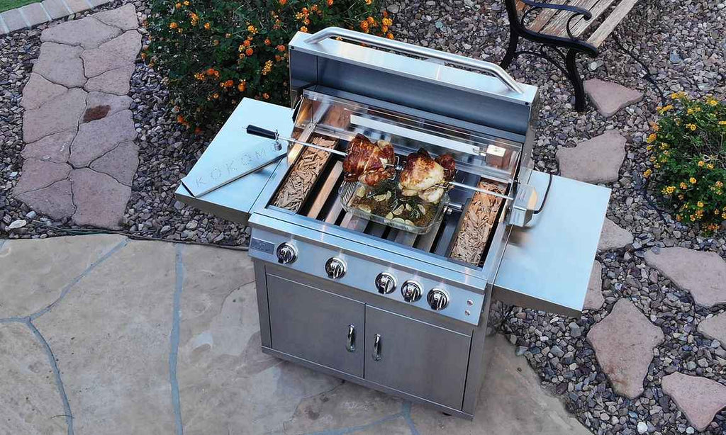 Stainless steel grill with food on a patio