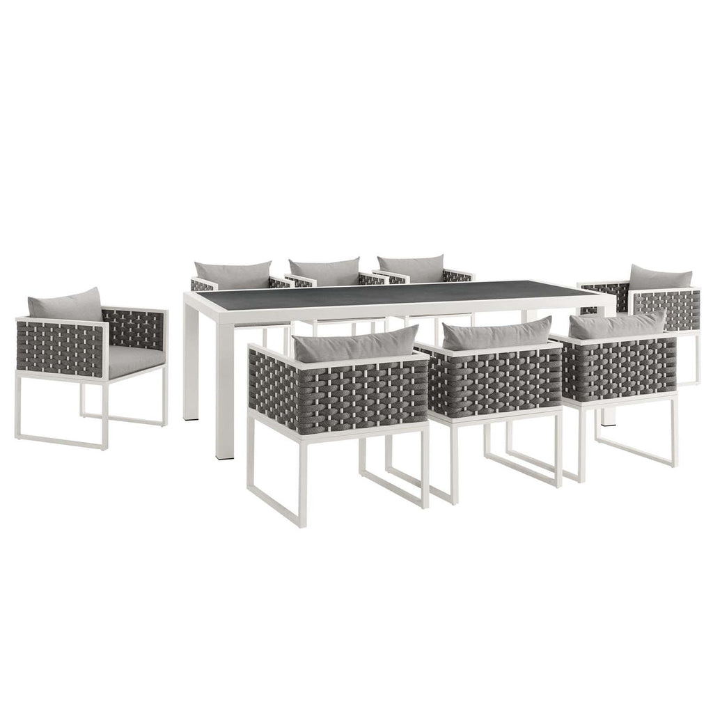 Outdoor furniture set with a table and chairs on a white background