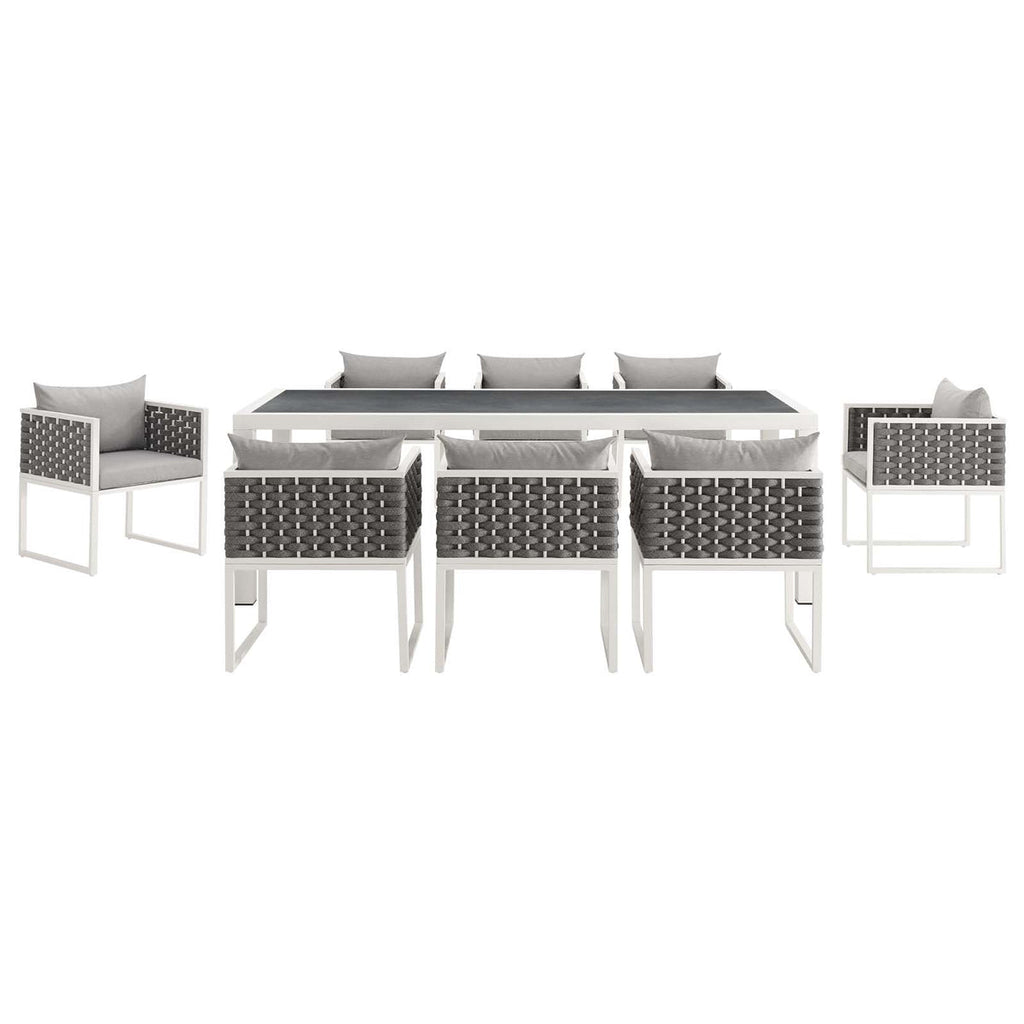 Outdoor furniture set with a table and chairs on a white background