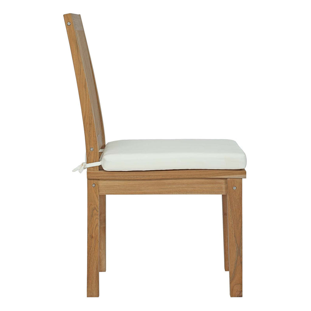 Wooden chair with a white cushion on a white background