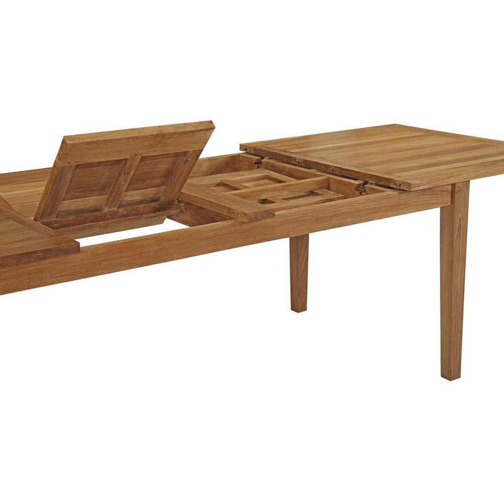Wooden outdoor table with two leaf extensions on a white background
