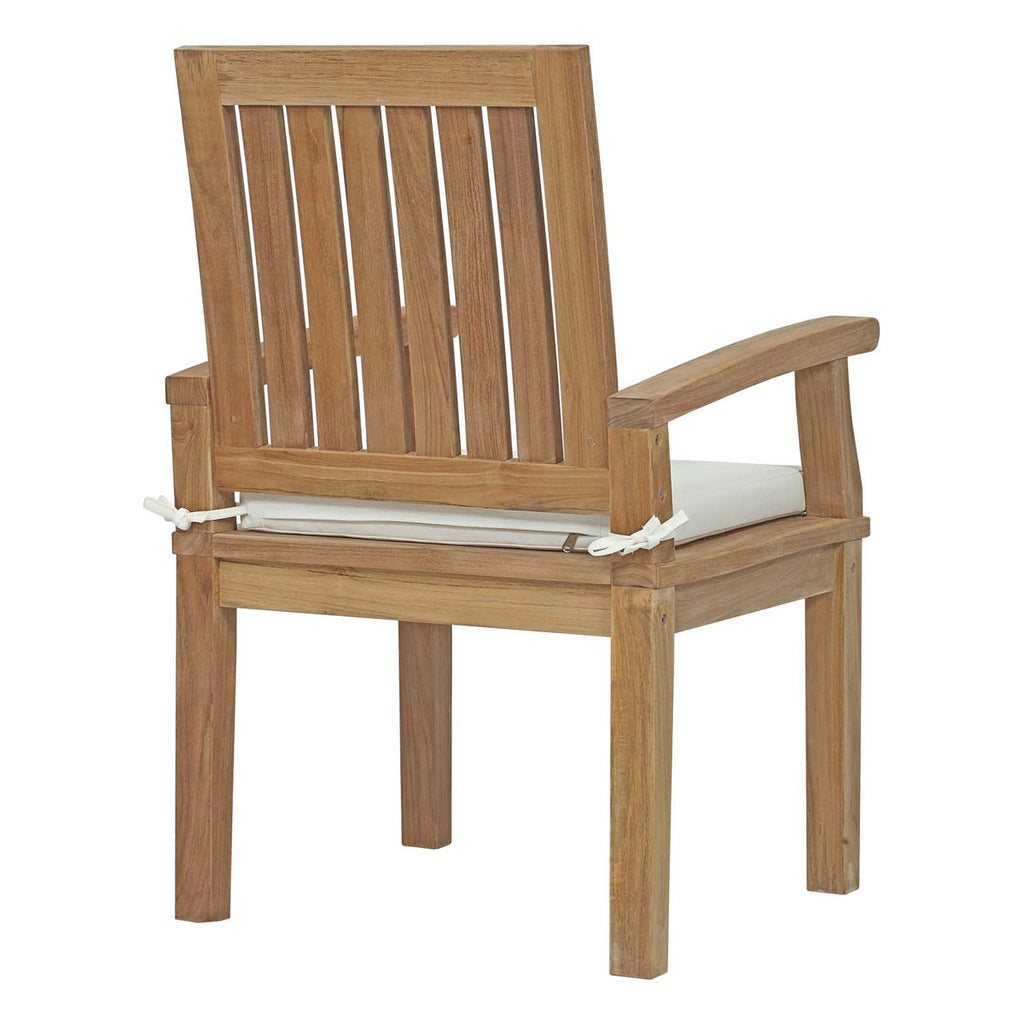 Wooden chair with a white cushion on a white background