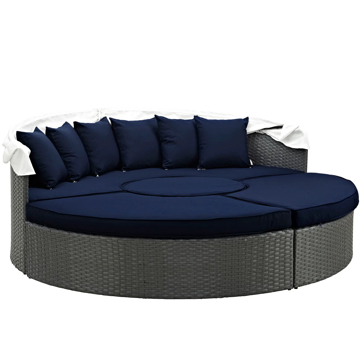 Round outdoor sofa with navy cushions and gray frame on a white background