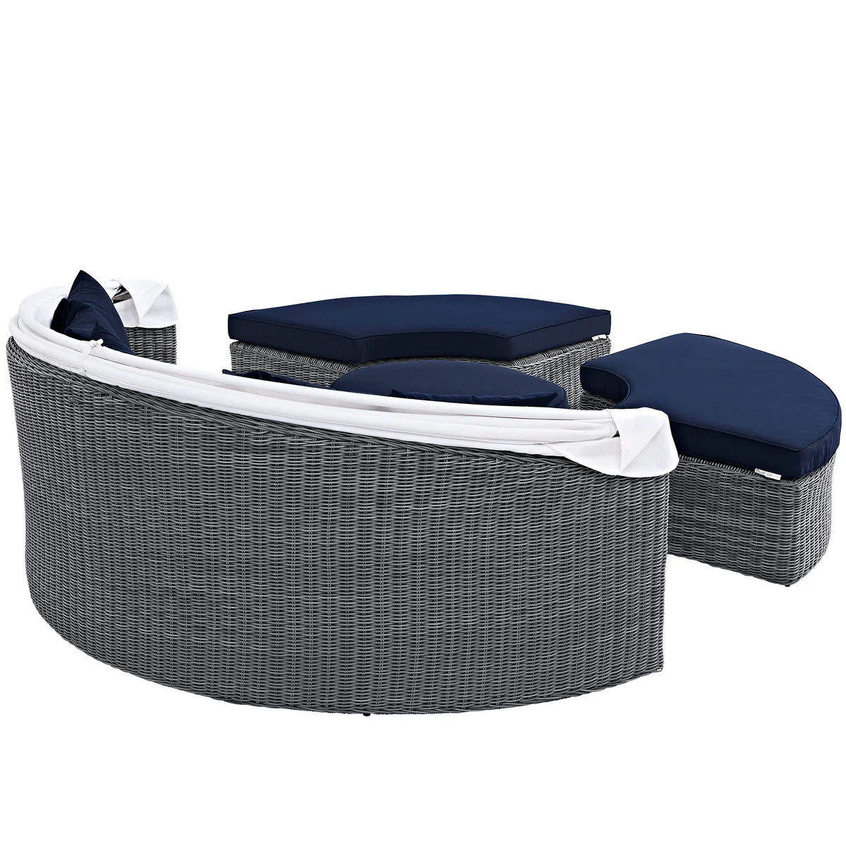 Outdoor furniture set with gray wicker chairs and navy cushions on a white background