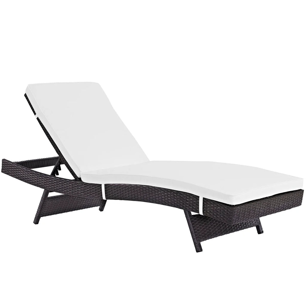 White lounge chair with black woven frame on a white background