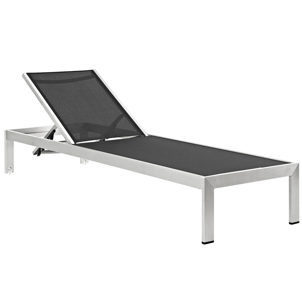 Black sun lounger with silver frame on a white background