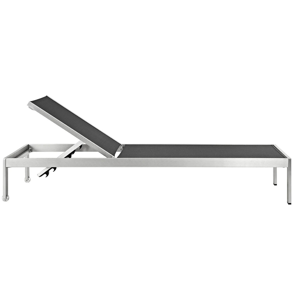 Black sun chaise lounger with metal frame on a white background