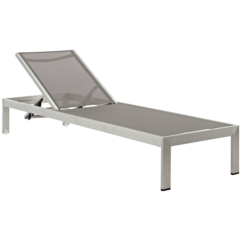 Gray lounge chair with mesh back on a white background