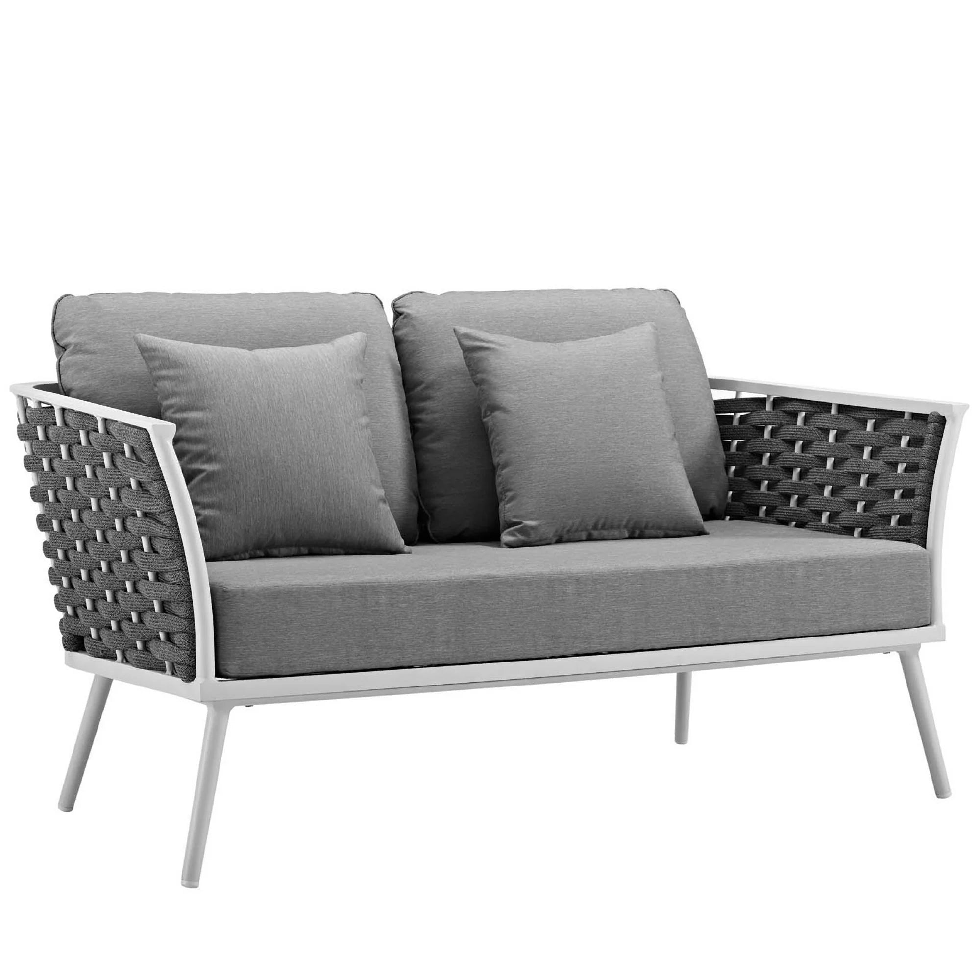 Gray outdoor sofa with cushions on a white background