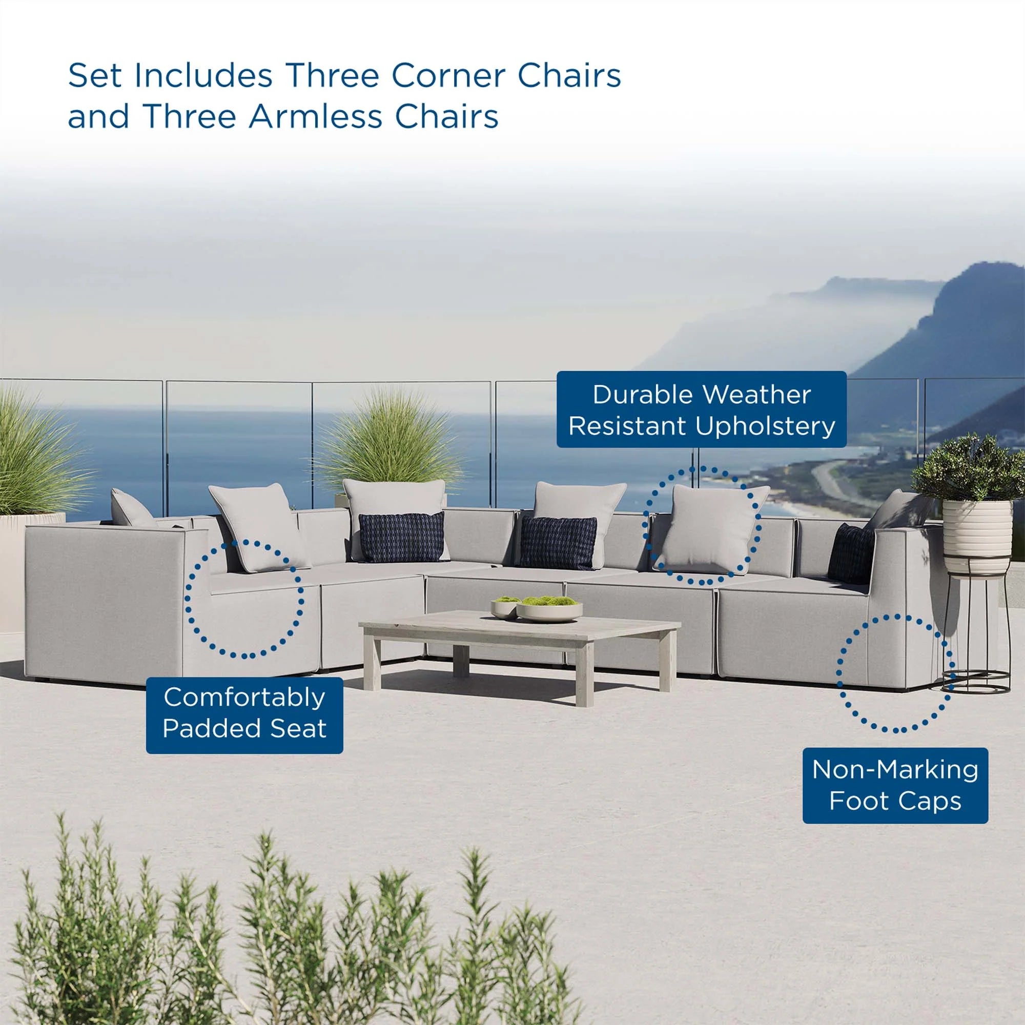 Outdoor furniture set with corner chairs and armless chairs on a patio with ocean view.