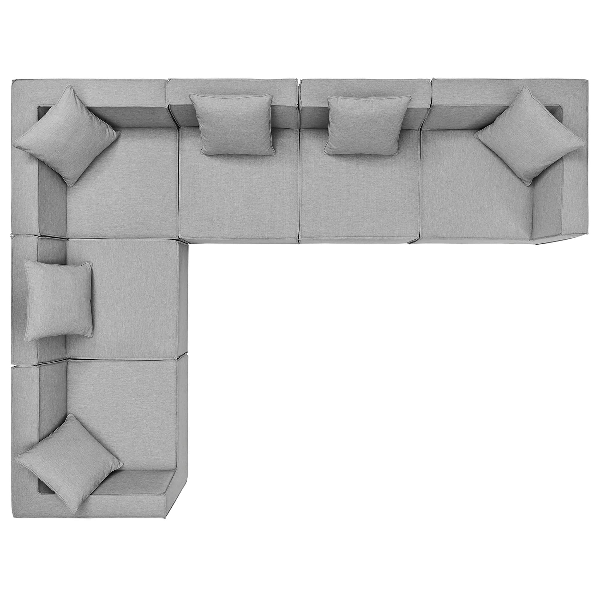 Gray sectional sofa with cushions on a white background