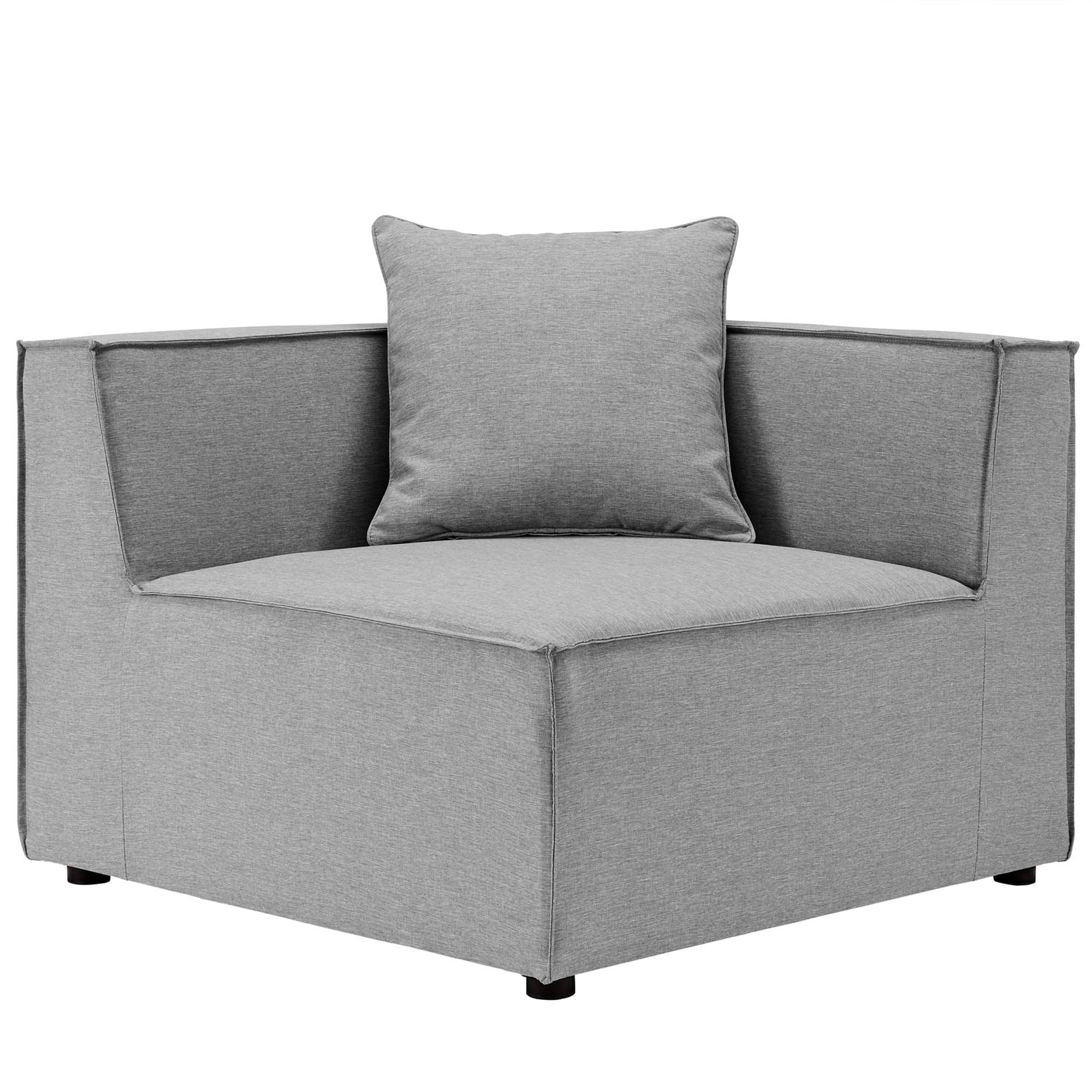 Gray upholstered chair with a single cushion on a white background