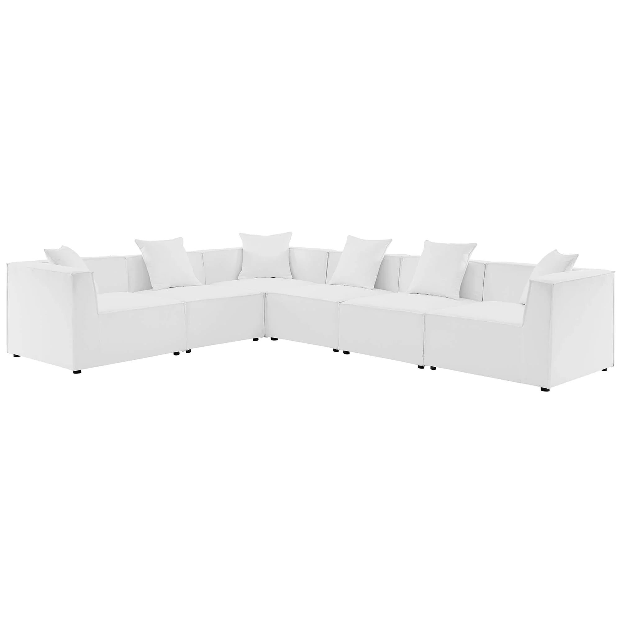 White sectional sofa with multiple cushions on a white background