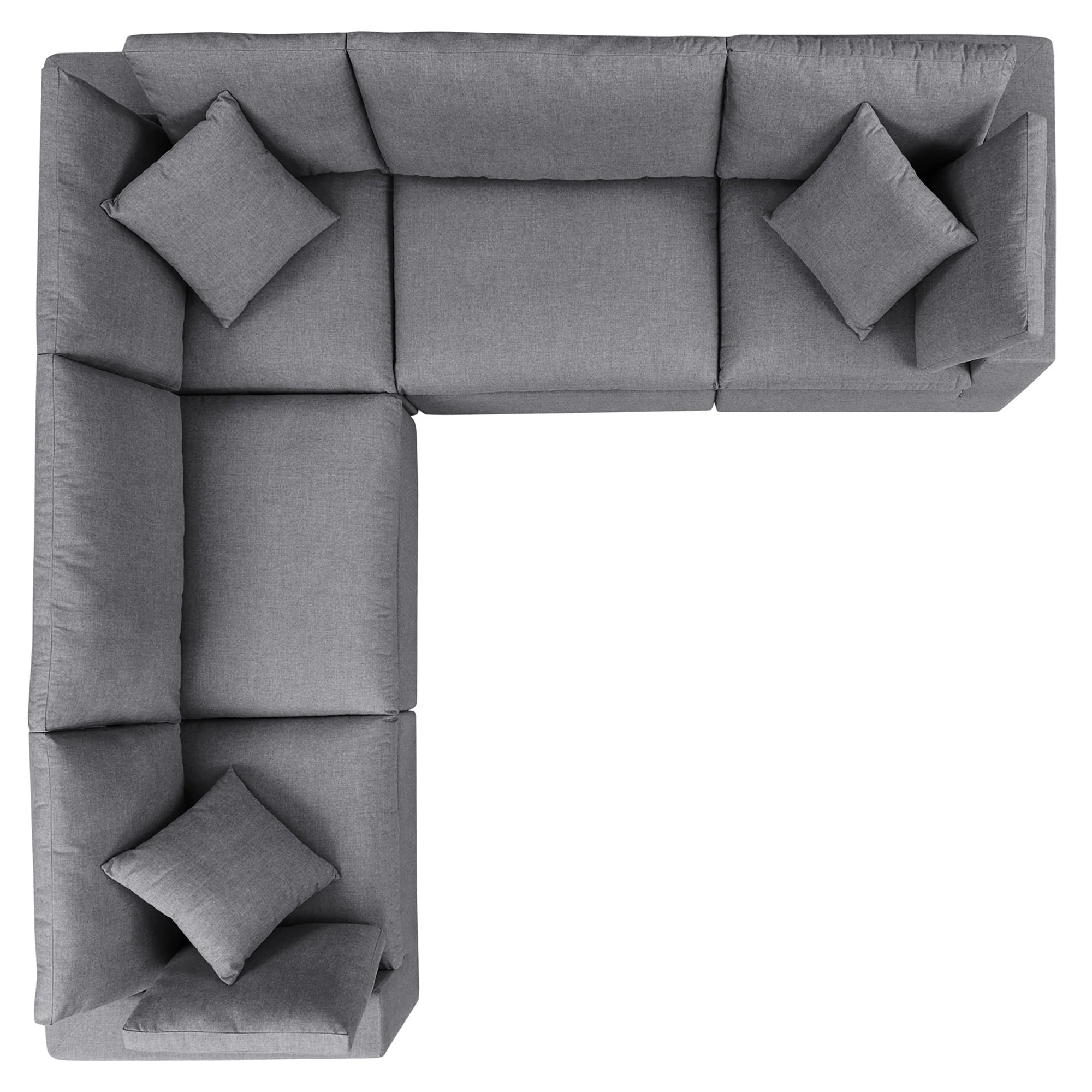 Gray sectional sofa with cushions on a white background