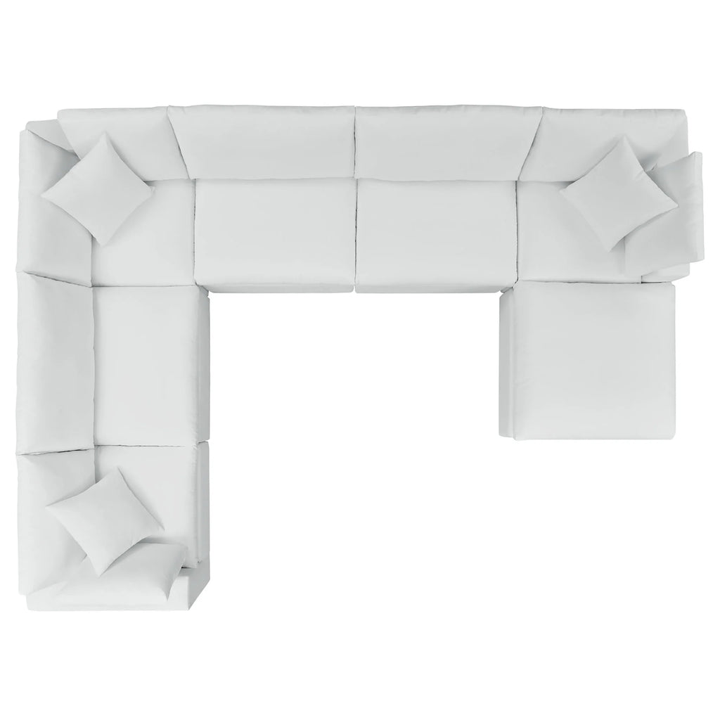 White sectional sofa with geometric design on a white background
