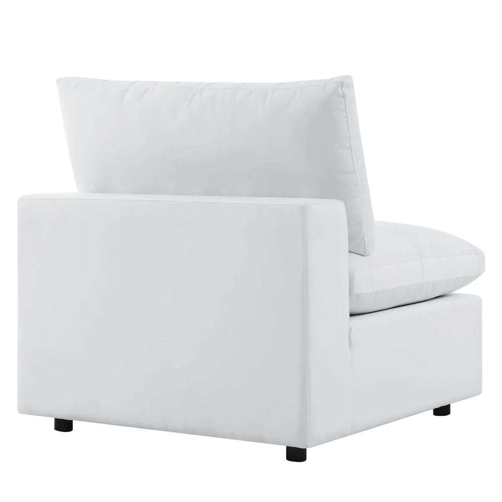 White armchair with a pillow on a white background