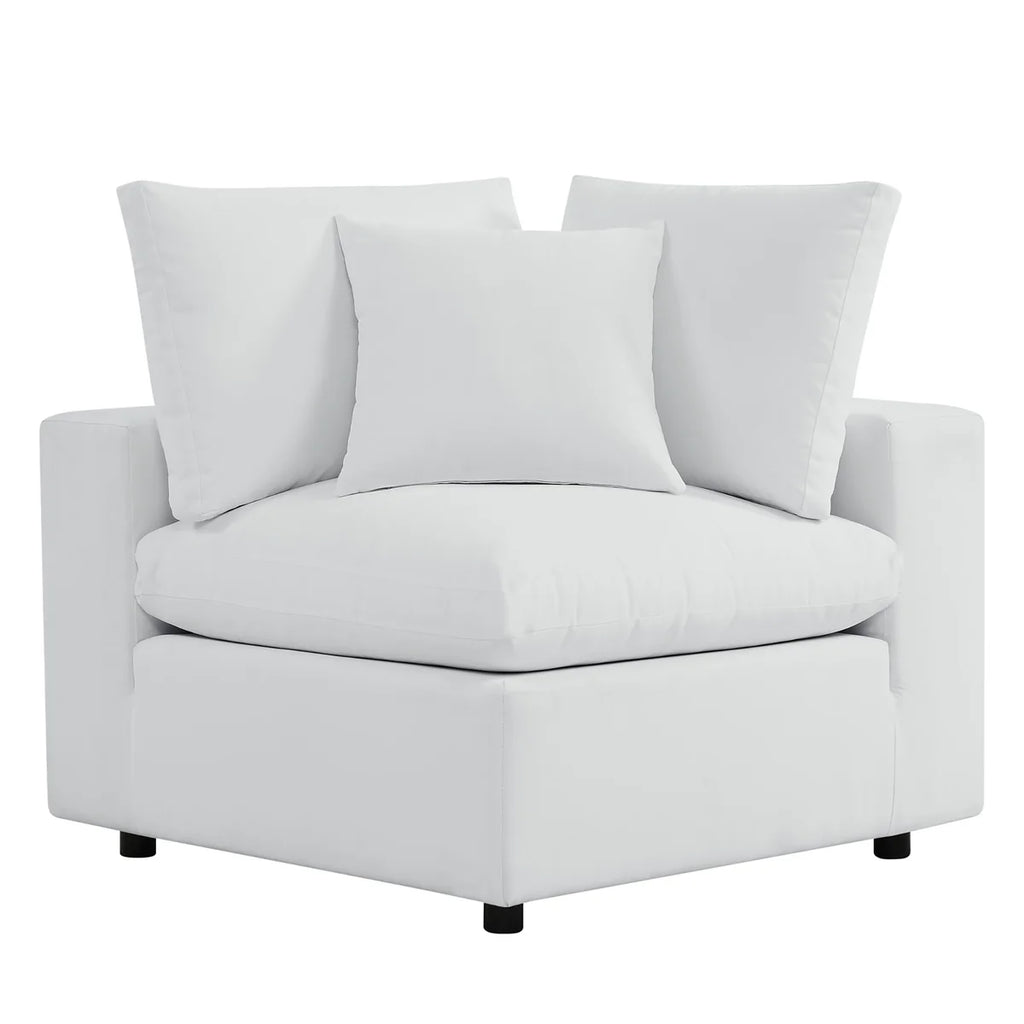 White armchair with cushions on a white background