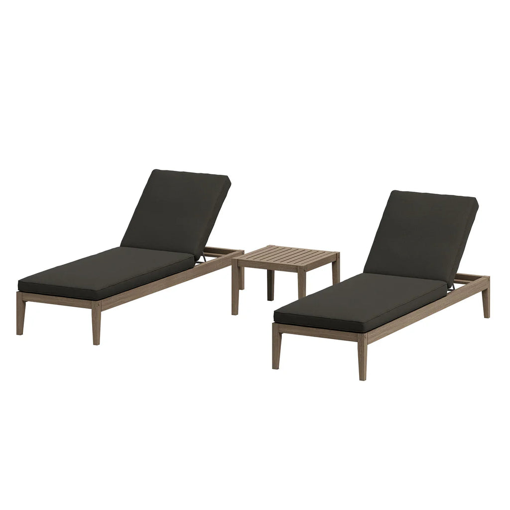 Two outdoor lounge chairs with cushions and a small table on a white background