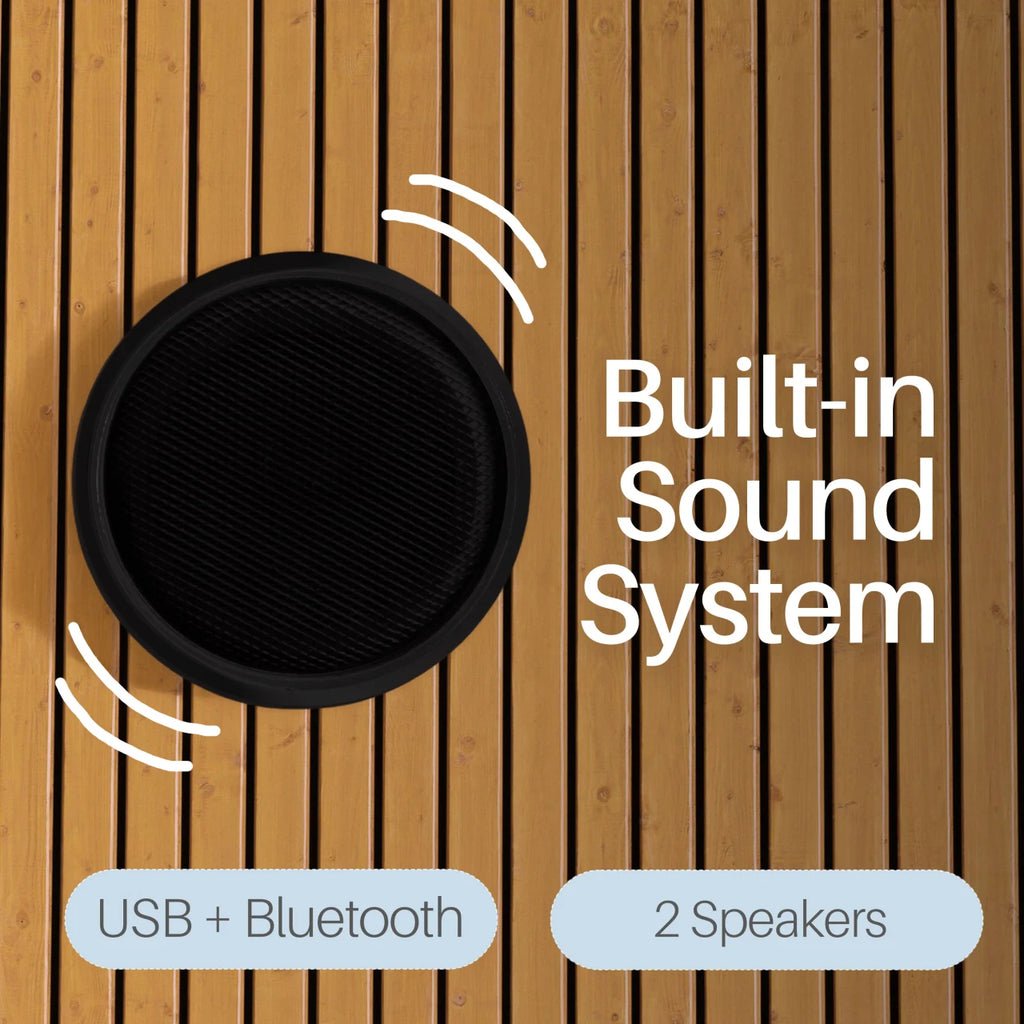 Black speaker with 'Built-in Sound System' text on a wooden background
