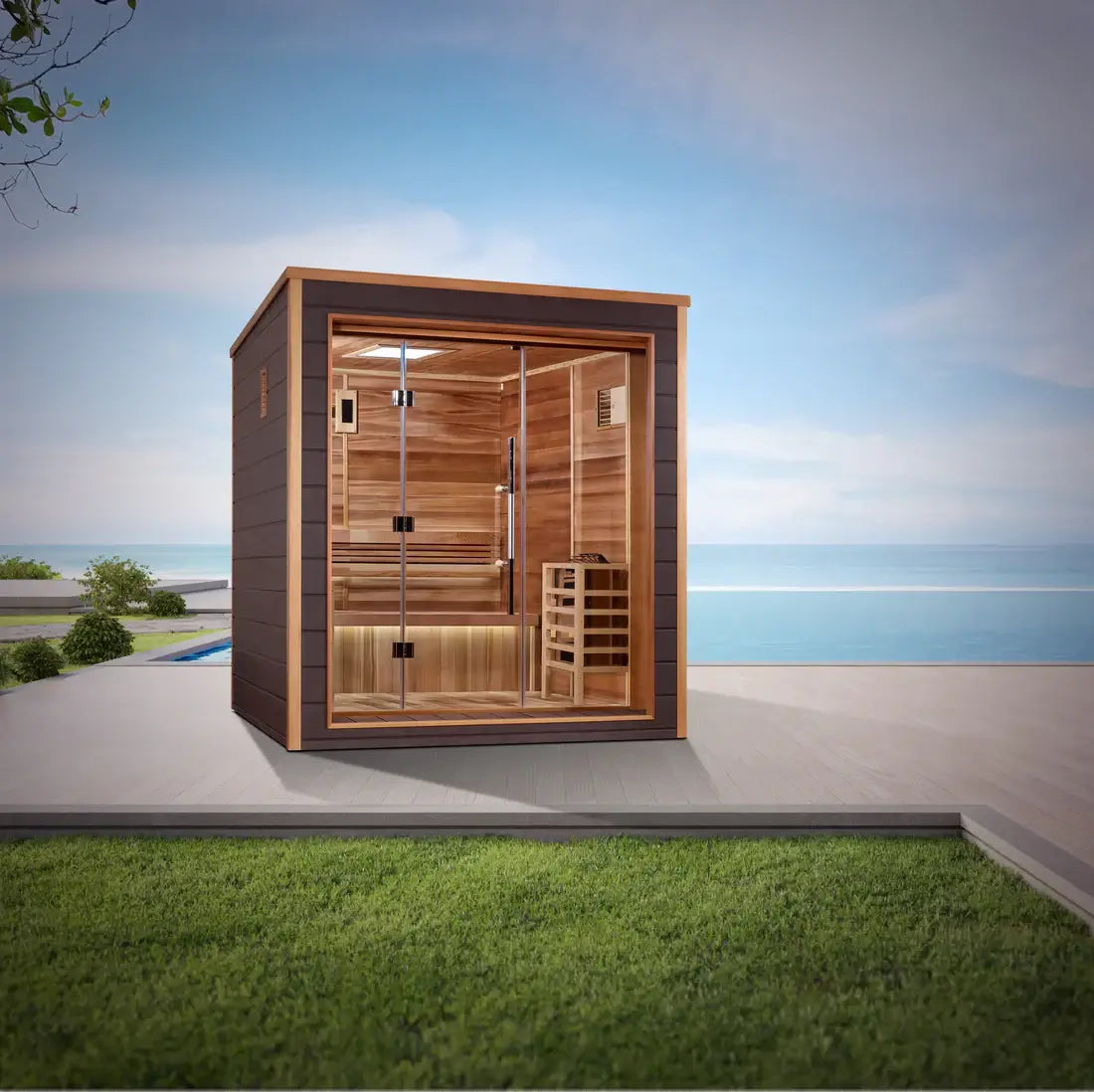 Wooden outdoor sauna with glass door on a patio with grass and blue sky background