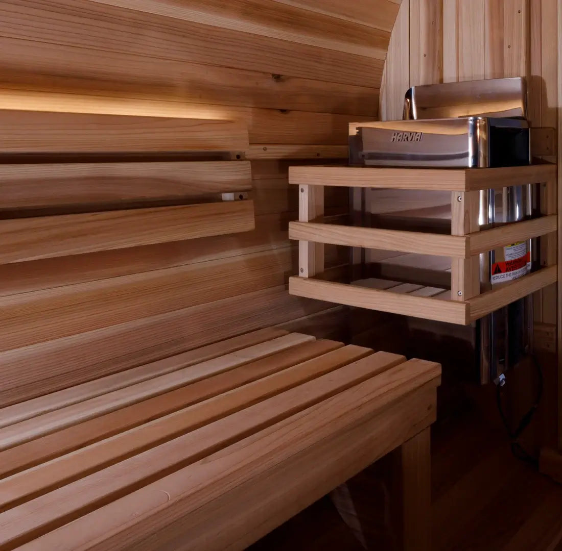 Wooden sauna interior with bench and shelves.