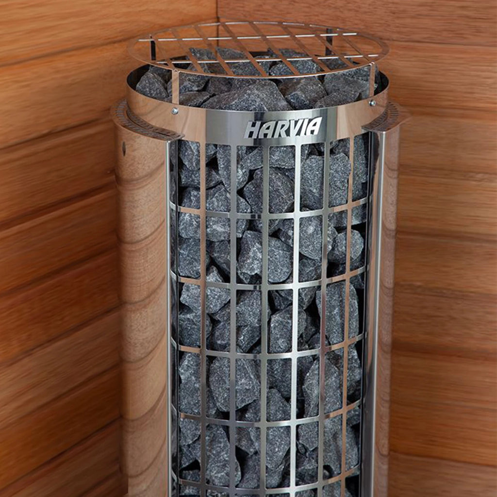 Harvia sauna heater with WiFi control featuring a sleek metal design and stone capacity inside a wooden sauna.