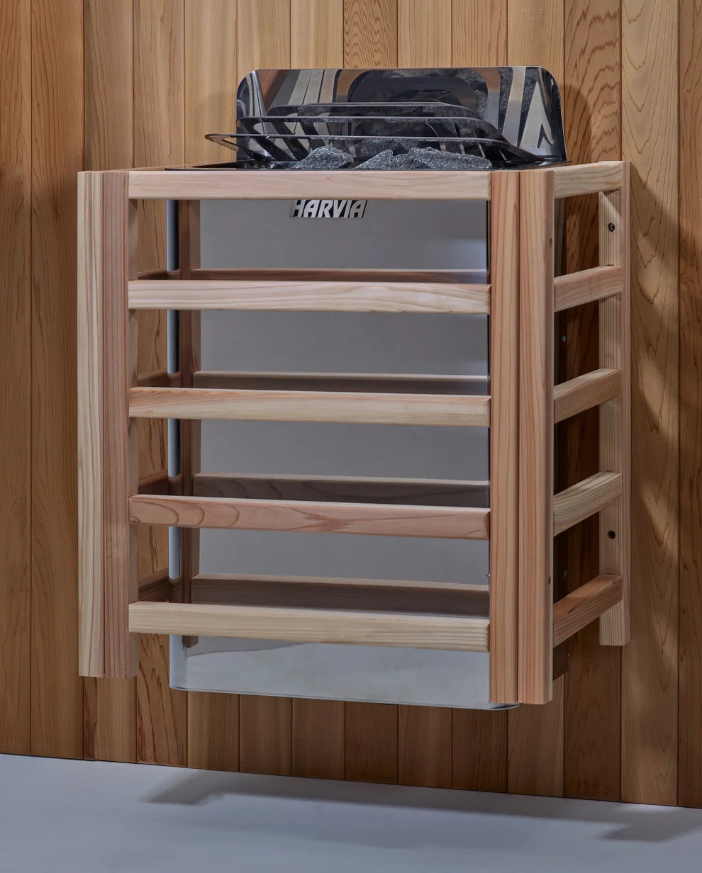 Wooden sauna shelf with Harvia branding against a wooden sauna wall.