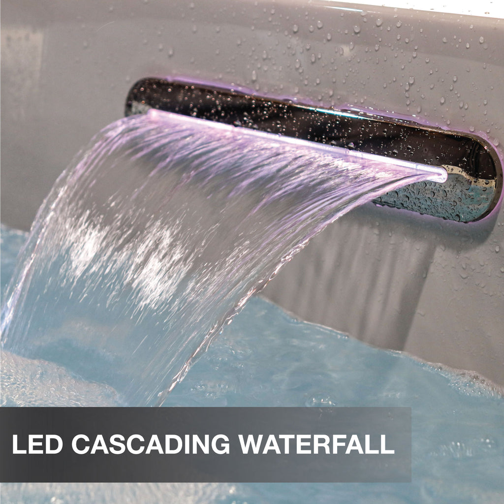 LED cascading waterfall feature with water flowing and purple lighting.