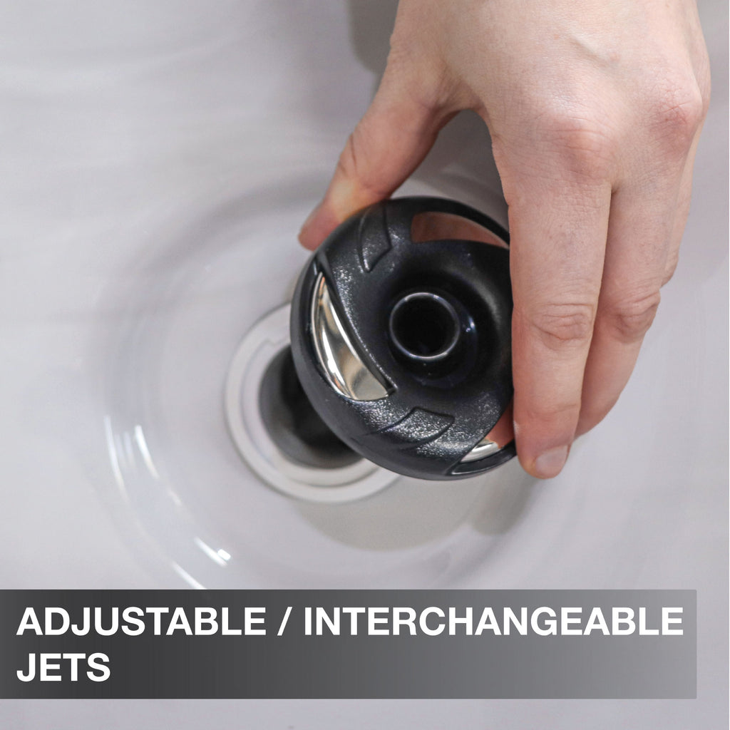 Hand adjusting an adjustable interchangeble jet in a sink