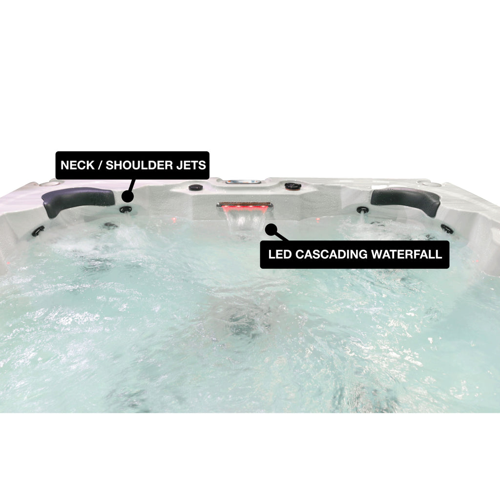 Hot tub with labeled neck/shoulder jets and LED cascading waterfall feature.