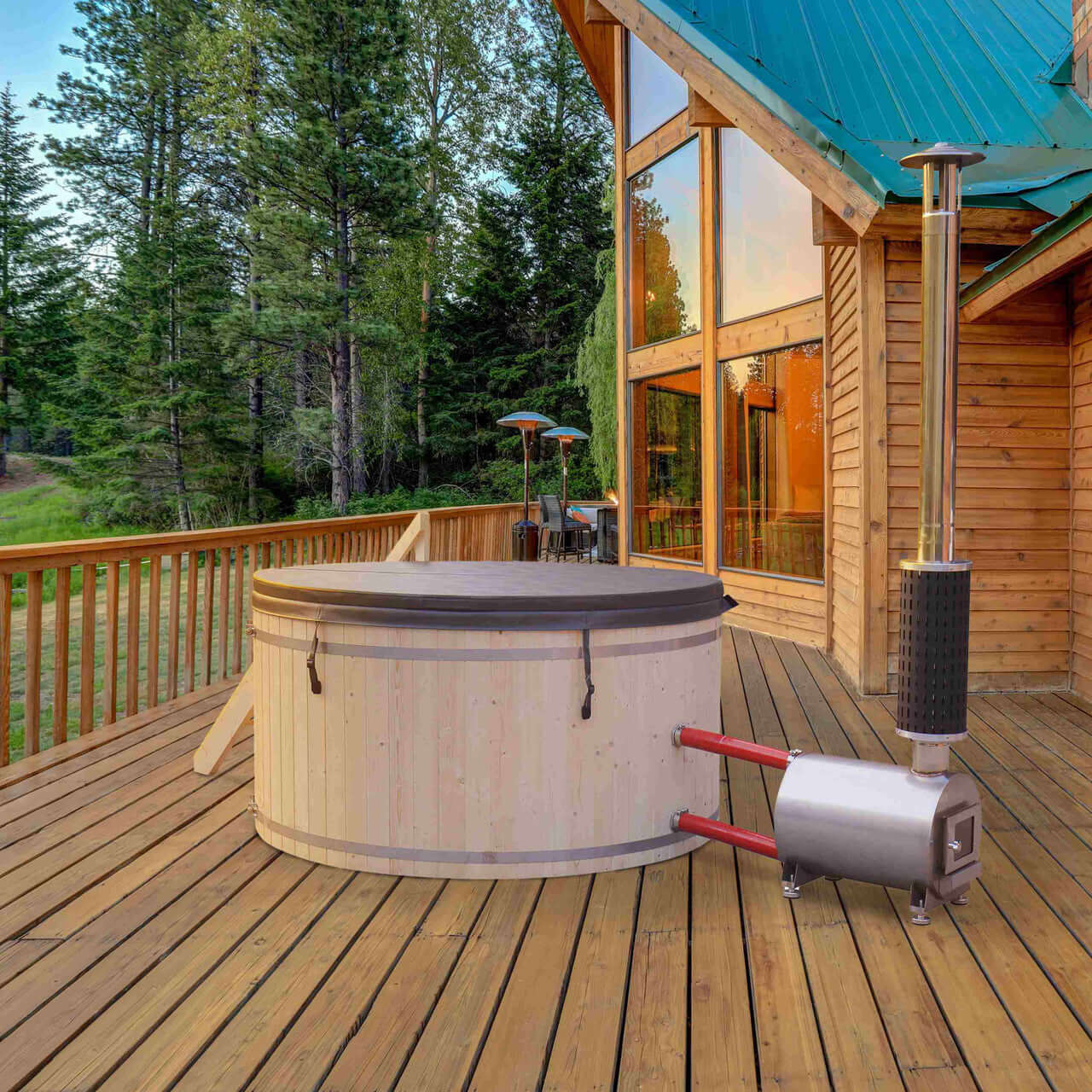 Wooden hot tub on a wooden deck with a cabin in the background