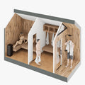A 3D architectural rendering of a compact wooden sauna cabin with a steam room and shower area, shown in a cutaway view with two people inside demonstrating use.