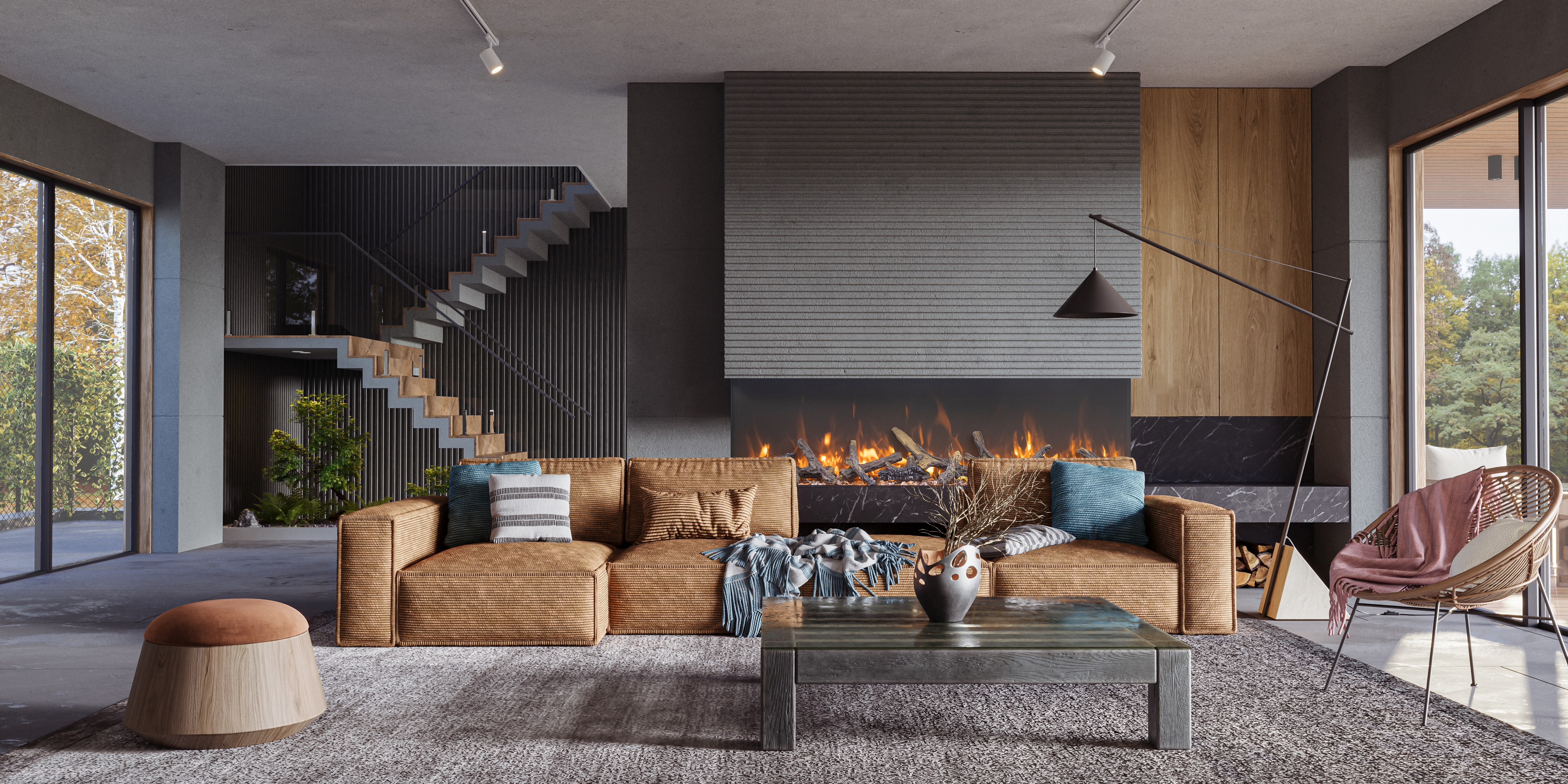 Modern living room with a fireplace, sectional sofa, and decorative items.