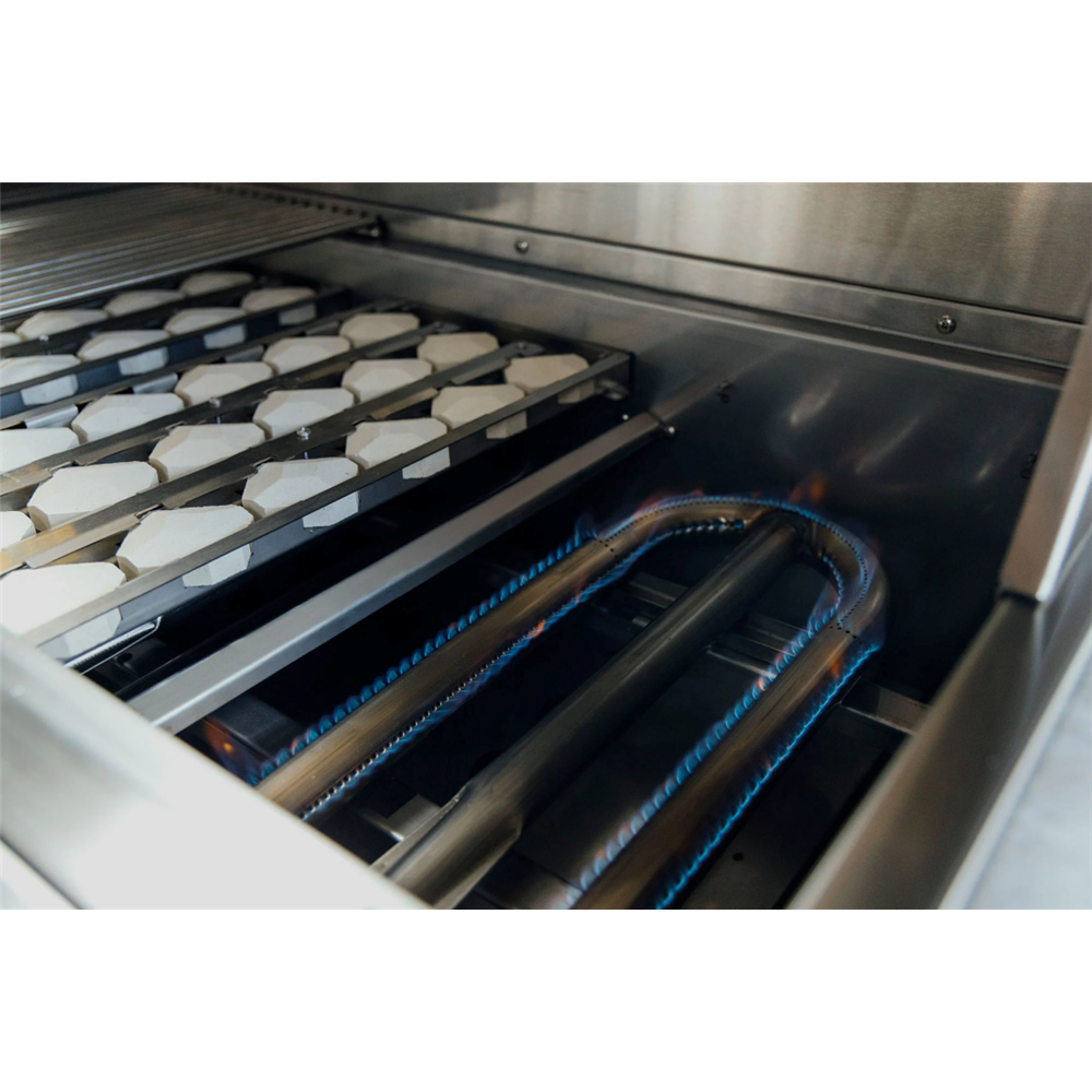 Commercial oven with a tray of heart-shaped cookies inside