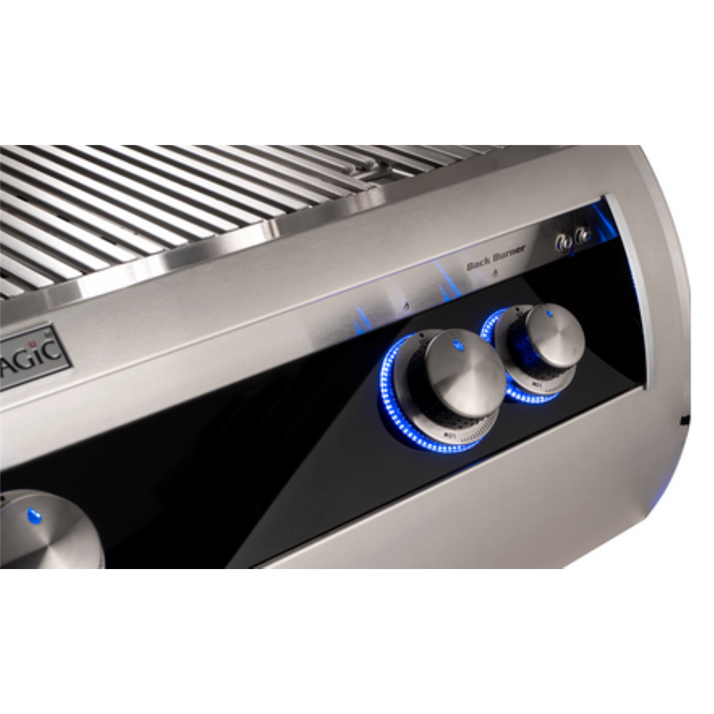 Close-up of a stainless steel gas grill control panel with silver knobs glowing blue, labeled Magic and Back Burner.