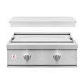 A stainless steel outdoor gas grill with a flat griddle plate, two control knobs, and a small red and white logo badge on the lower left front panel, shown against a plain white background.