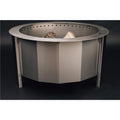 Metal fire pit with rocks on a black background