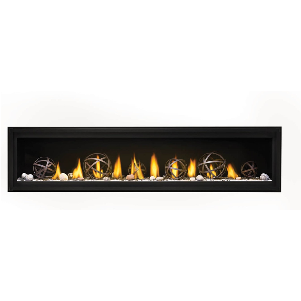 A long, rectangular black fireplace insert with visible flames and decorative metal orb elements over white stones, shown against a plain white background.