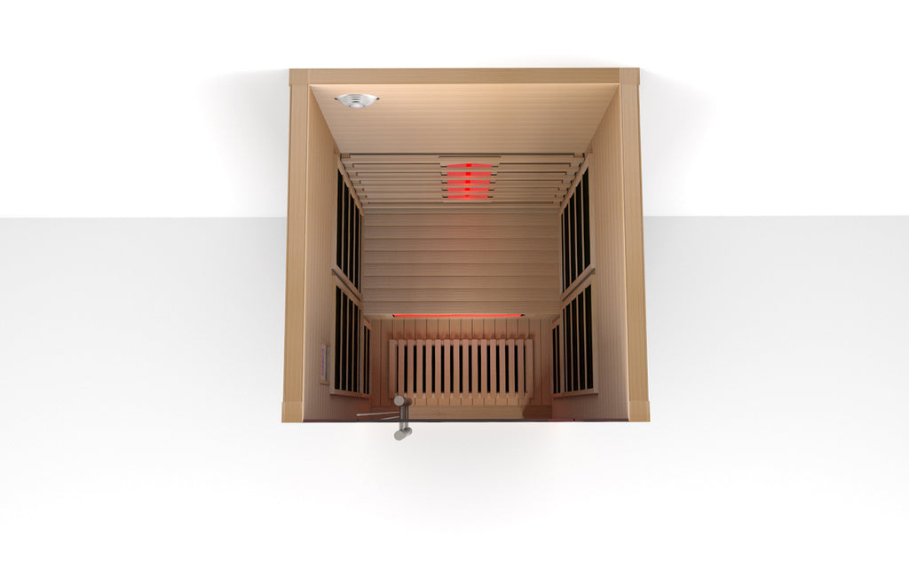 Infrared sauna with wooden interior and red light on a white background