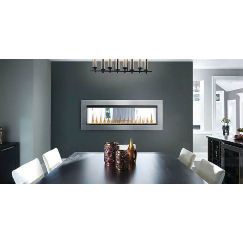 Modern dining room with a wall-mounted fireplace and white chairs.