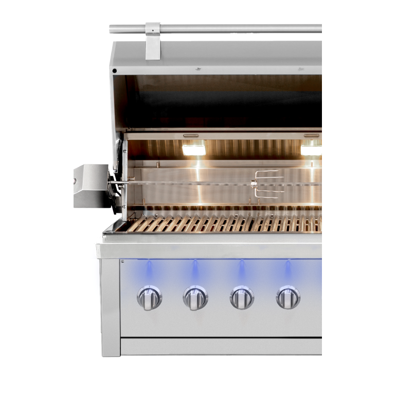 A stainless steel outdoor gas grill with four control knobs, shown with the lid open and interior lights on, against a plain white background.