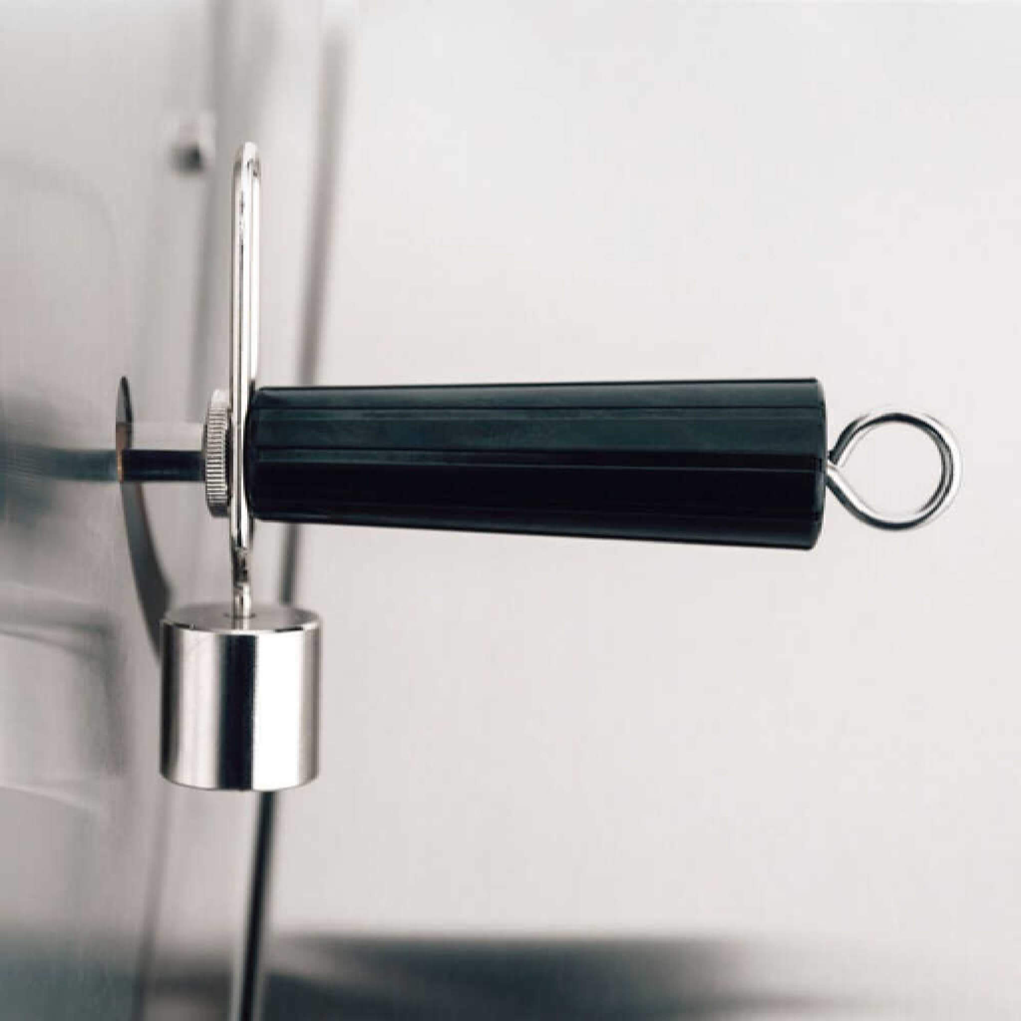 Black and silver door handle on a glass door