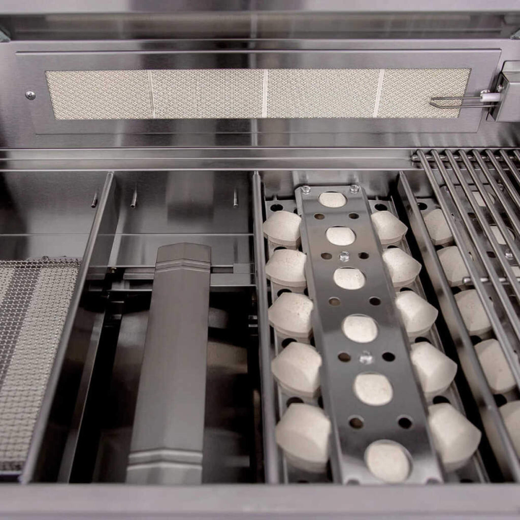 Industrial oven with a rack of white spherical objects inside