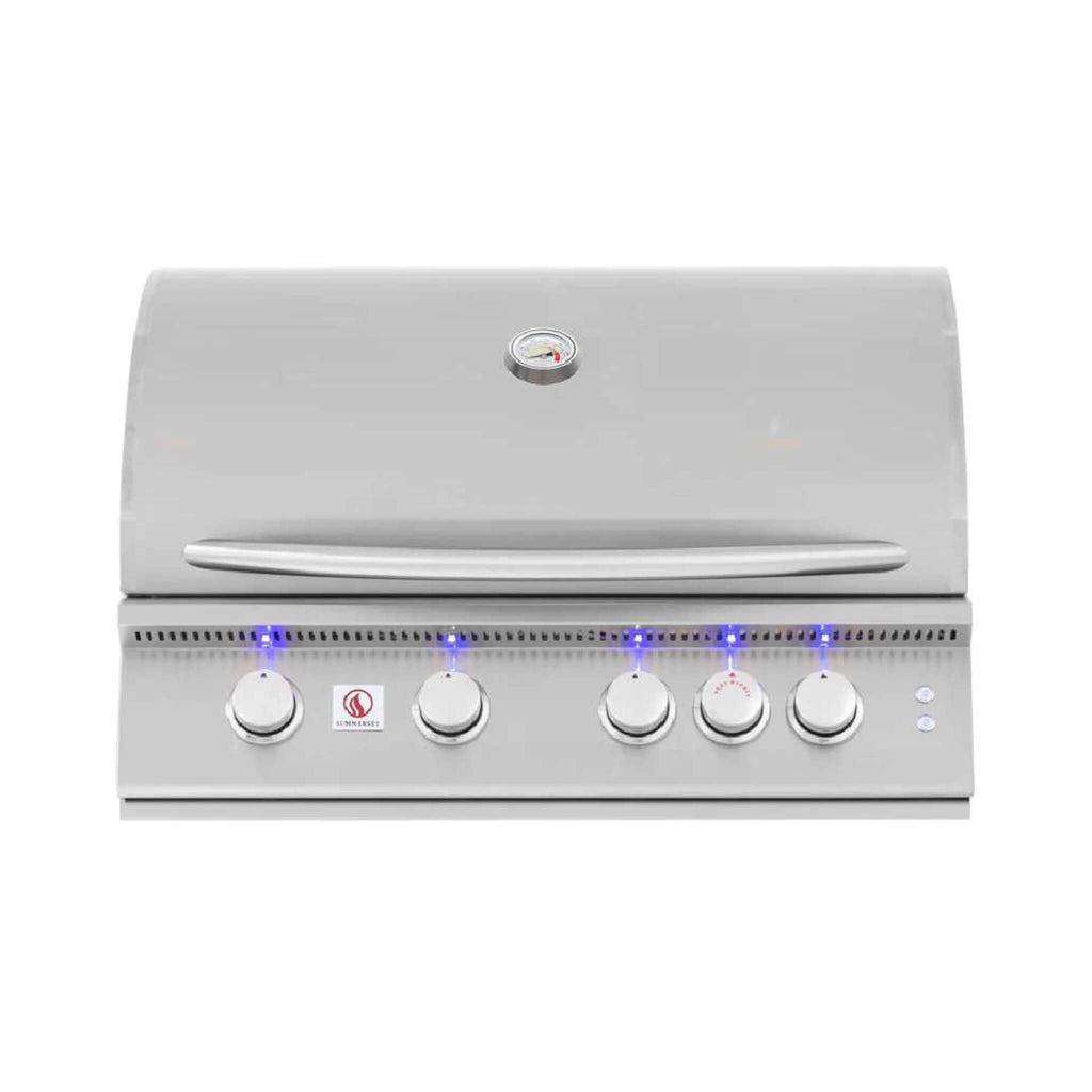 Stainless steel grill with control knobs on a white background