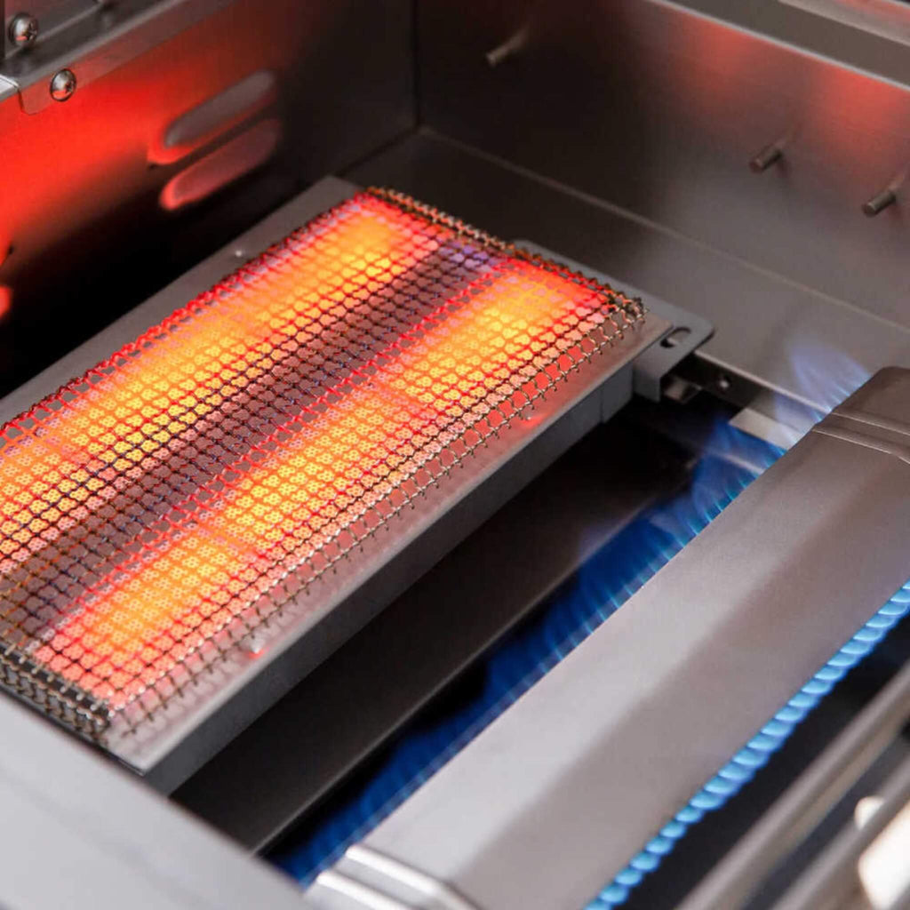 Close-up of a glowing grill grate inside an open barbecue