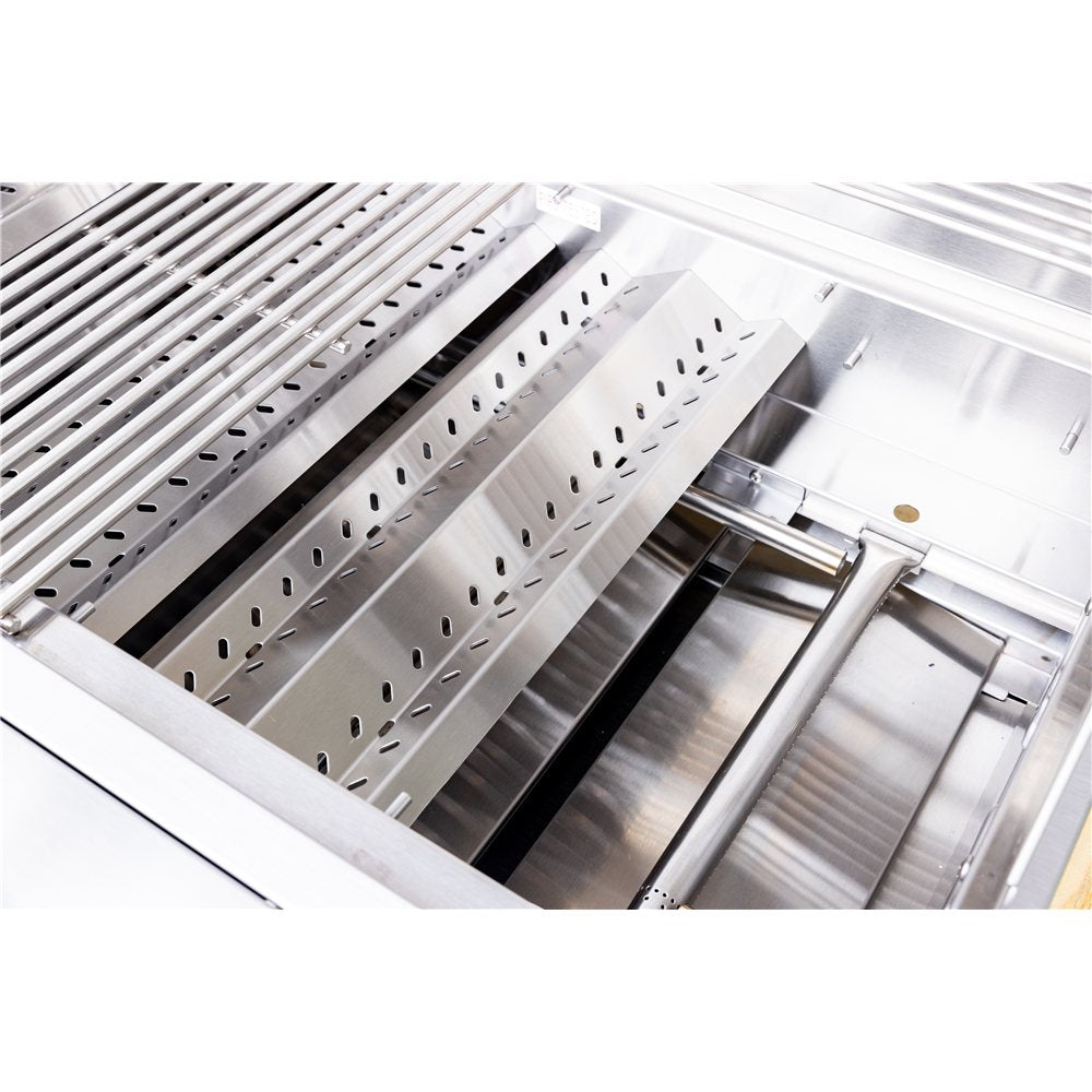Stainless steel kitchen drawer with multiple compartments on a white background