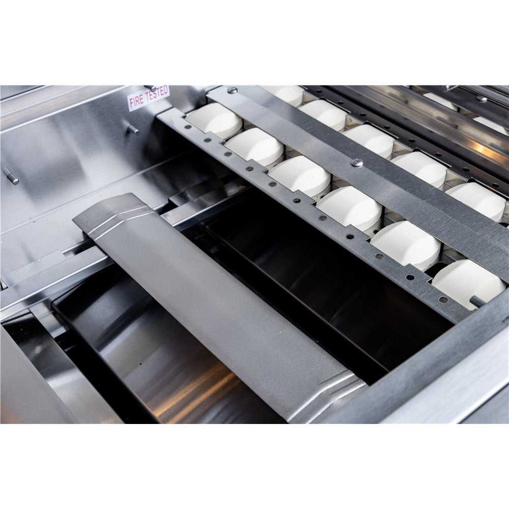 Close-up of a kitchen appliance with white components and metallic finish.